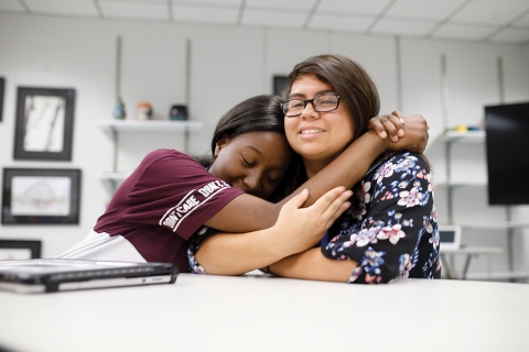 Barron Collier High School sophomores Brianna Alcee and Mariely Velasquez became friends through JROTC and a new club that encourages students to “get out of their comfort zones” and connect with other classmates. 